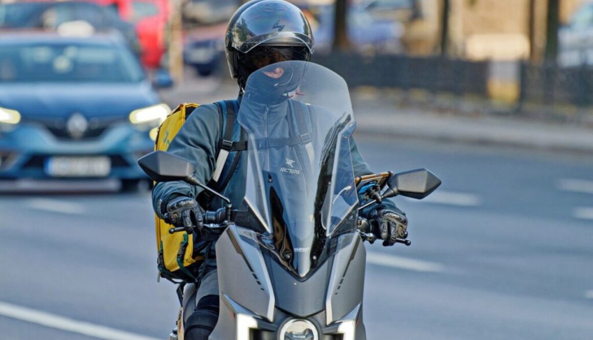 motorcyclist man motorcycle courier 7561737